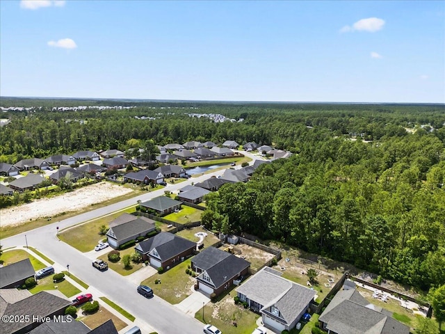 1009 Stonesthrow Ct, Leland, NC 28451 - aerial view of residential area featuring a heavily wooded area