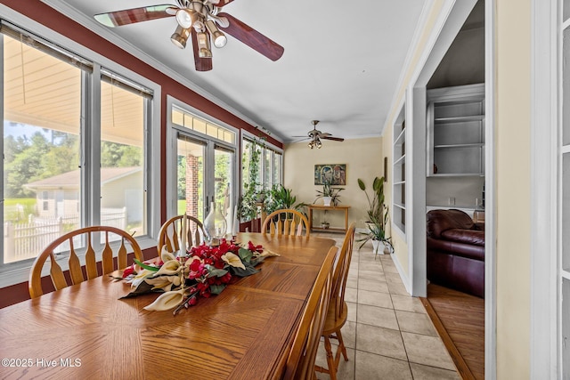 1910 Big Mill Rd, Williamston, NC 27892 - dining area with a ceiling fan, light tile patterned floors, ornamental molding, and french doors