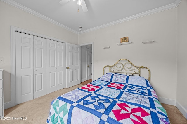 1910 Big Mill Rd, Williamston, NC 27892 - bedroom featuring carpet floors, ornamental molding, a closet, and a ceiling fan