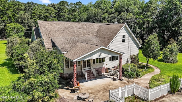 1910 Big Mill Rd, Williamston, NC 27892 - view of front of house with a patio area and a shingled roof