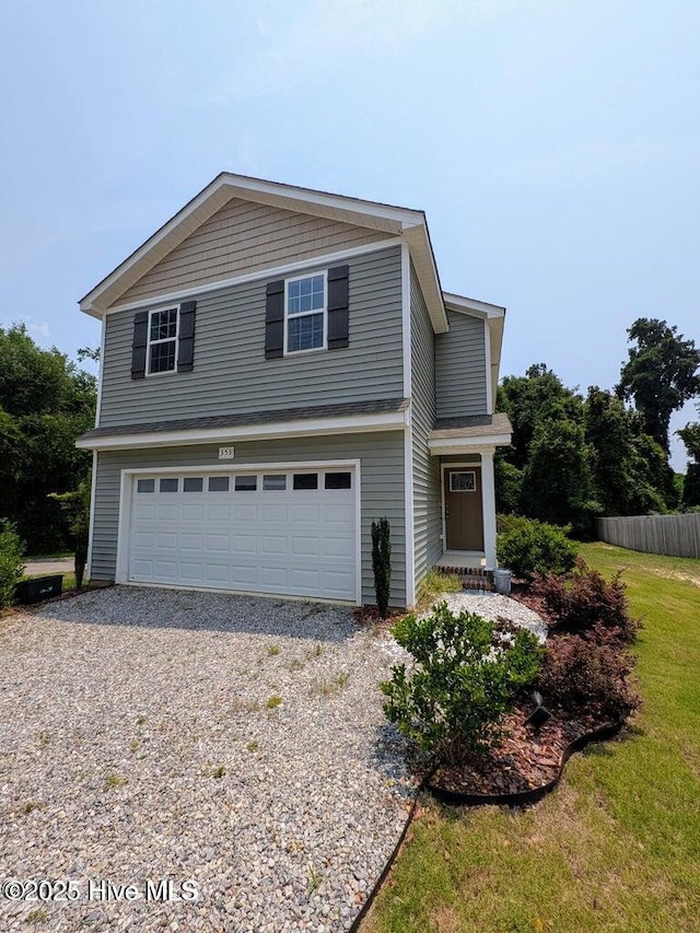 353 N Stephens St, Southern Pines, NC 28387 - traditional-style house featuring gravel driveway and a garage