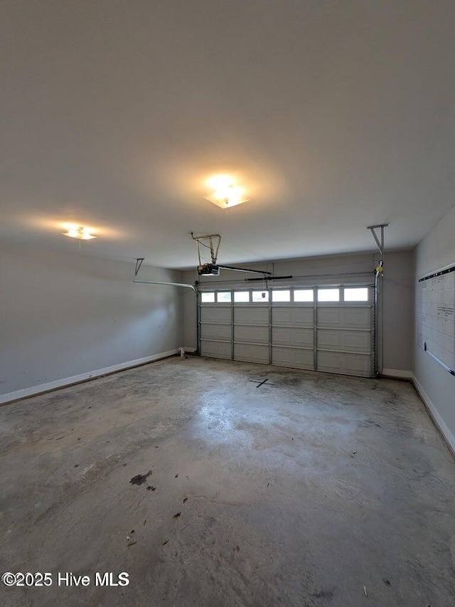 353 N Stephens St, Southern Pines, NC 28387 - garage with a garage door opener and baseboards