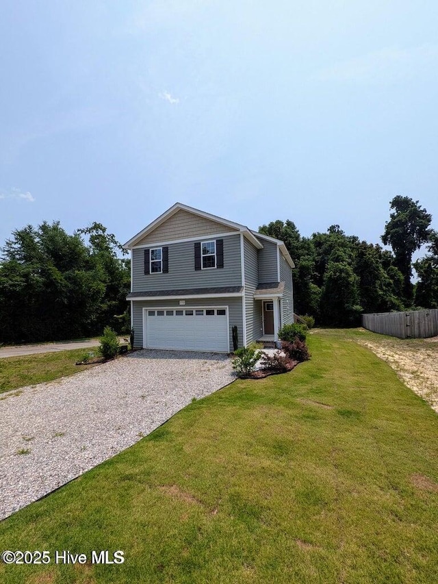353 N Stephens St, Southern Pines, NC 28387 - view of front of property featuring driveway and an attached garage