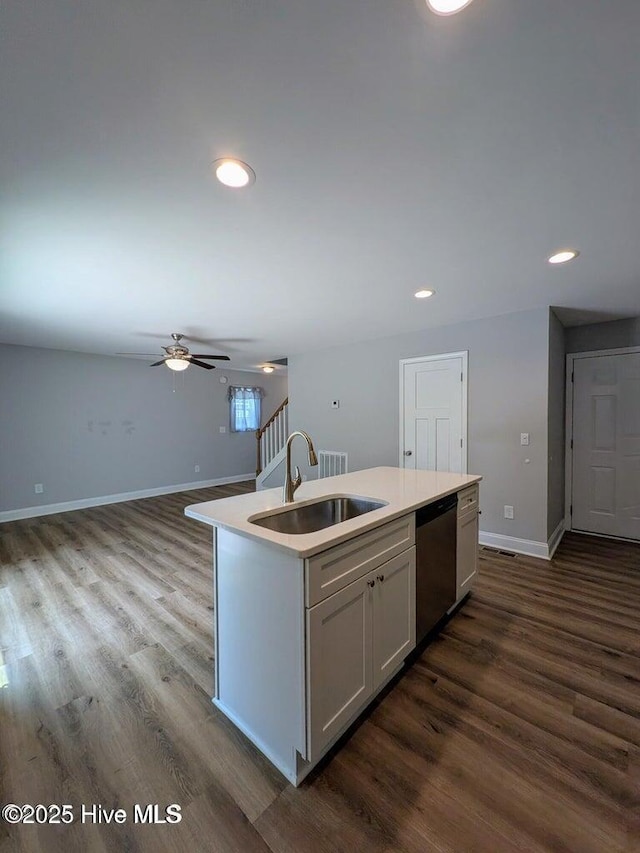 353 N Stephens St, Southern Pines, NC 28387 - kitchen featuring a sink, dishwasher, ceiling fan, a center island with sink, and dark wood-style floors