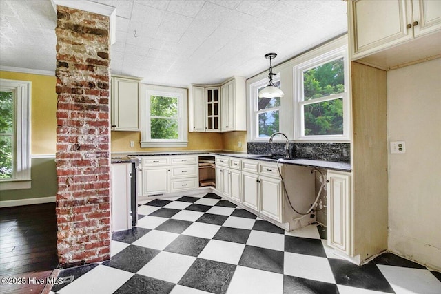 105 W Wayne St, Fremont, NC 27830 - kitchen with dark floors, cream cabinetry, pendant lighting, and dark countertops