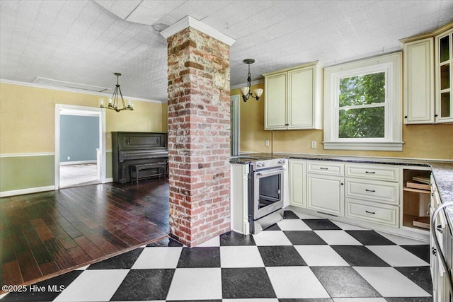 105 W Wayne St, Fremont, NC 27830 - kitchen featuring electric stove, cream cabinets, a chandelier, pendant lighting, and crown molding