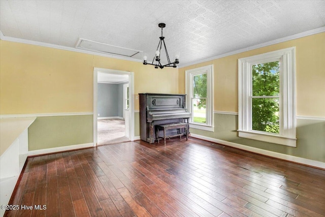 105 W Wayne St, Fremont, NC 27830 - unfurnished dining area with wood-type flooring and ornamental molding