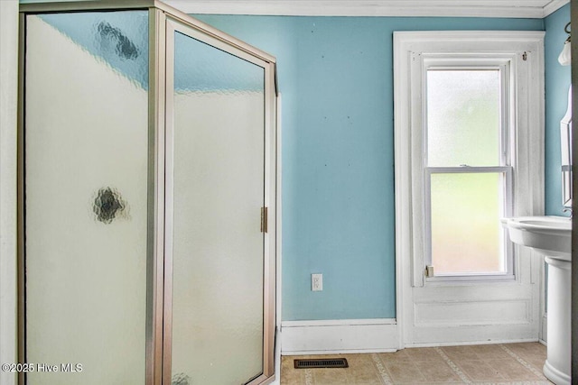 105 W Wayne St, Fremont, NC 27830 - bathroom with a stall shower and baseboards