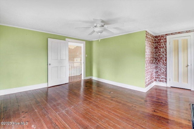 105 W Wayne St, Fremont, NC 27830 - spare room featuring hardwood / wood-style floors, crown molding, a ceiling fan, and brick wall
