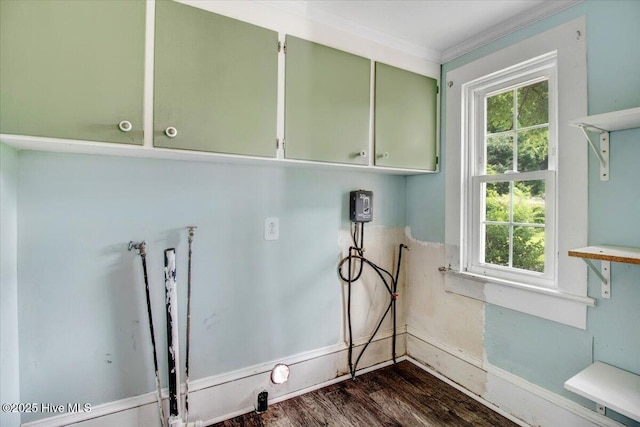 105 W Wayne St, Fremont, NC 27830 - laundry room featuring cabinet space, plenty of natural light, washer hookup, dark wood-type flooring, and crown molding