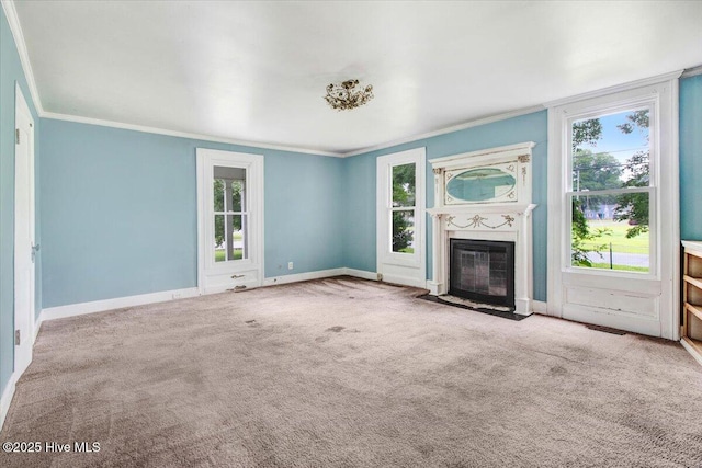 105 W Wayne St, Fremont, NC 27830 - unfurnished living room with crown molding, a fireplace with flush hearth, and carpet floors