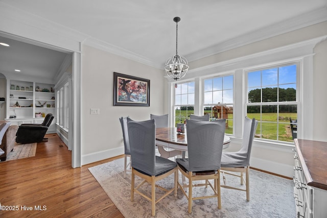 7145 Stokestown St Johns Rd, Ayden, NC 28513 - dining room featuring a chandelier, ornamental molding, plenty of natural light, light wood-style floors, and recessed lighting