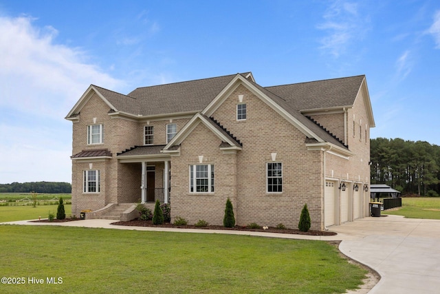 7145 Stokestown St Johns Rd, Ayden, NC 28513 - view of front of house with an attached garage, driveway, a front lawn, and brick siding