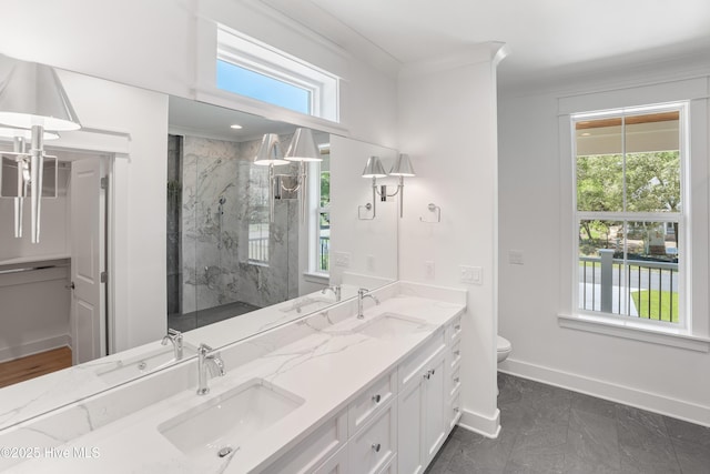3404 Eagle Crest Dr SW, Supply, NC 28462 - full bath featuring a marble finish shower, double vanity, marble look tile flooring, and crown molding