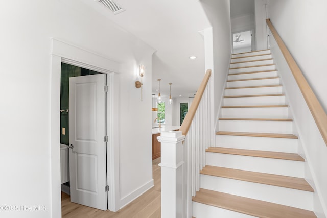 3404 Eagle Crest Dr SW, Supply, NC 28462 - staircase with wood finished floors and recessed lighting