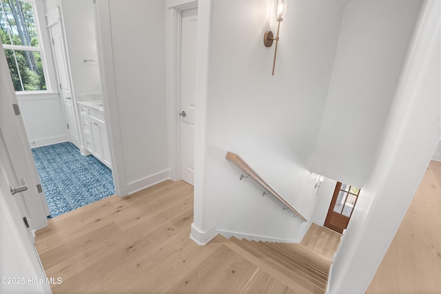 3404 Eagle Crest Dr SW, Supply, NC 28462 - hallway with an upstairs landing and light wood-type flooring