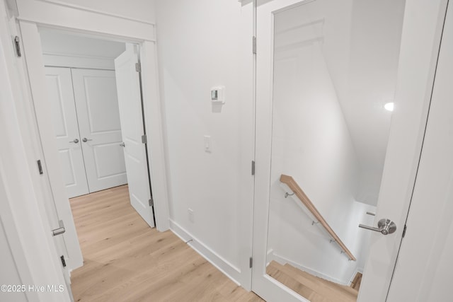 3404 Eagle Crest Dr SW, Supply, NC 28462 - hall featuring light wood-type flooring and an upstairs landing