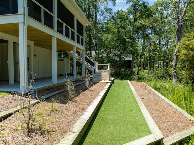3404 Eagle Crest Dr SW, Supply, NC 28462 - view of yard with a game area and stairway