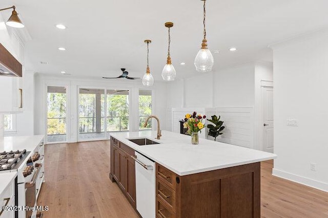 3404 Eagle Crest Dr SW, Supply, NC 28462 - kitchen with white appliances, a ceiling fan, light wood-type flooring, recessed lighting, and light countertops