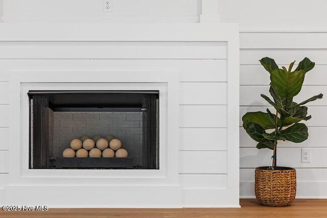 3404 Eagle Crest Dr SW, Supply, NC 28462 - detailed view of wood finished floors and a fireplace