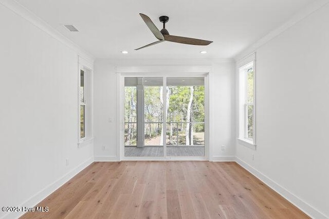 3404 Eagle Crest Dr SW, Supply, NC 28462 - empty room with ceiling fan, light wood-style floors, recessed lighting, and crown molding