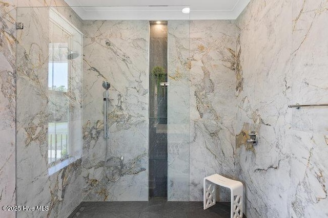 3404 Eagle Crest Dr SW, Supply, NC 28462 - bathroom featuring crown molding, a marble finish shower, tile walls, and plenty of natural light