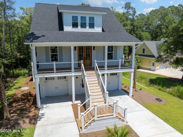 3404 Eagle Crest Dr SW, Supply, NC 28462 - beach home featuring stairs, covered porch, driveway, a garage, and a shingled roof
