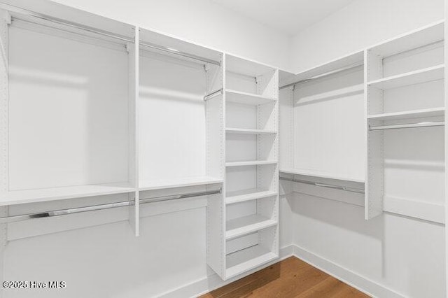 3404 Eagle Crest Dr SW, Supply, NC 28462 - walk in closet featuring dark wood-type flooring