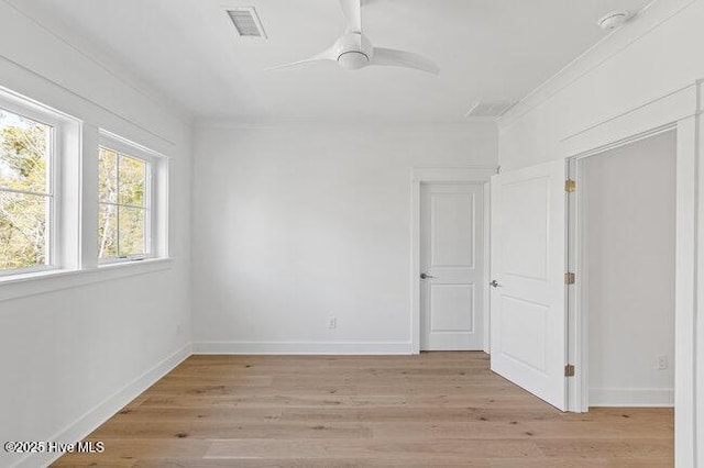 3404 Eagle Crest Dr SW, Supply, NC 28462 - empty room featuring crown molding, light wood-type flooring, and a ceiling fan
