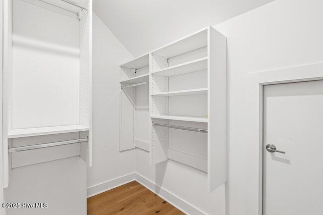 3404 Eagle Crest Dr SW, Supply, NC 28462 - walk in closet featuring wood finished floors