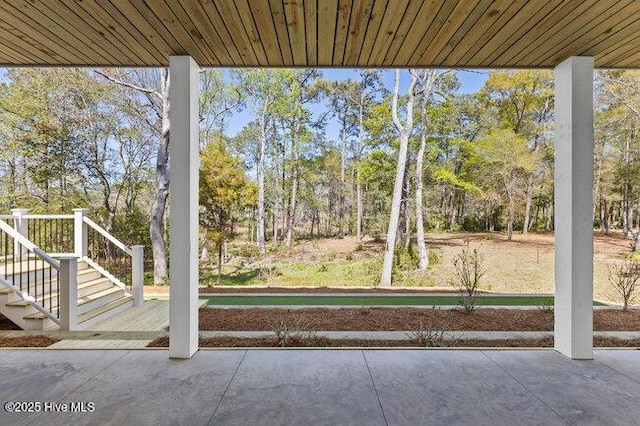 3404 Eagle Crest Dr SW, Supply, NC 28462 - view of patio / terrace featuring view of wooded area and a bocce ball area