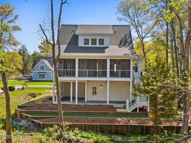 3404 Eagle Crest Dr SW, Supply, NC 28462 - back of property with a sunroom and board and batten siding