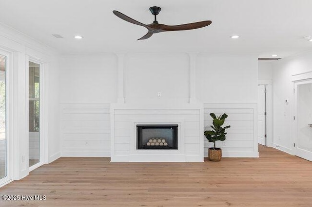 3404 Eagle Crest Dr SW, Supply, NC 28462 - unfurnished living room featuring ceiling fan, light wood-type flooring, recessed lighting, and a fireplace