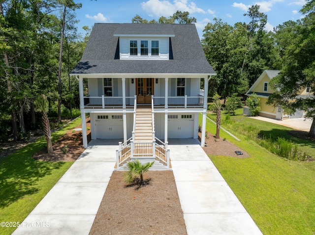 3404 Eagle Crest Dr SW, Supply, NC 28462 - coastal home featuring stairway, covered porch, a garage, and driveway