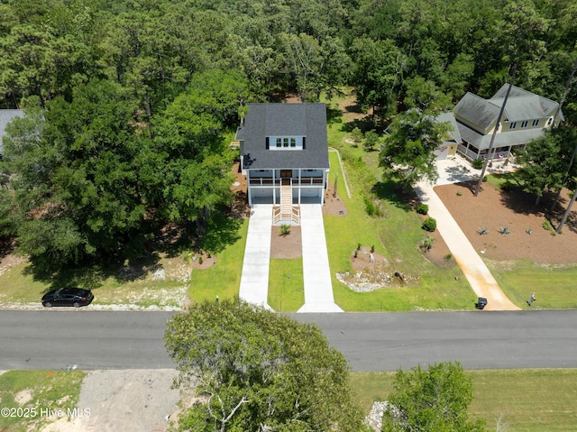 3404 Eagle Crest Dr SW, Supply, NC 28462 - aerial view of property and surrounding area featuring a heavily wooded area