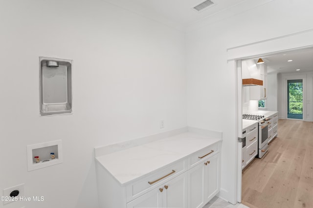3404 Eagle Crest Dr SW, Supply, NC 28462 - washroom with washer hookup, light wood-type flooring, and recessed lighting
