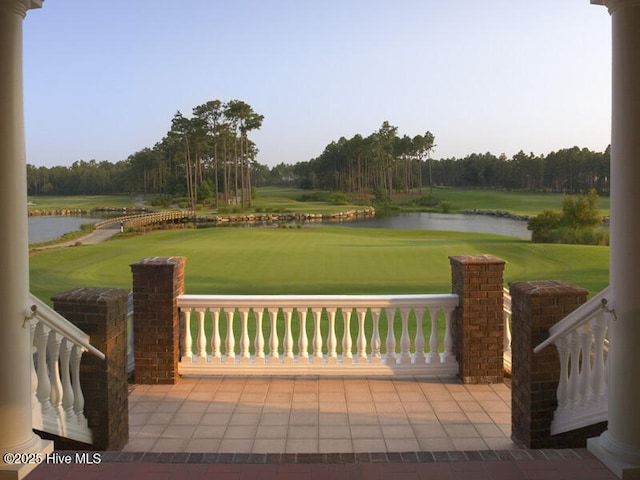 6857 Beckman Cir SW Unit 55, Ocean Isle Beach, NC 28469 - view of patio / terrace featuring a water view and golf course view