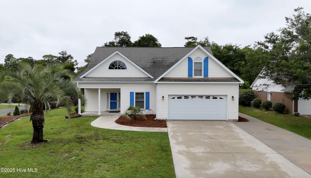 1 Bay Dr, Sneads Ferry, NC 28460 - traditional home with driveway, a front lawn, a garage, roof with shingles, and a porch