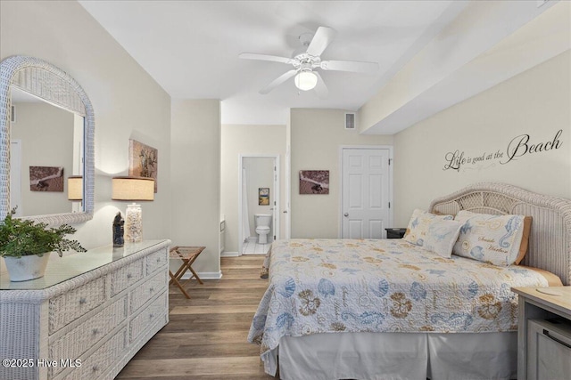 145 Royal Poste Rd # 3110, Sunset Beach, NC 28468 - bedroom featuring dark wood-style floors, connected bathroom, and ceiling fan