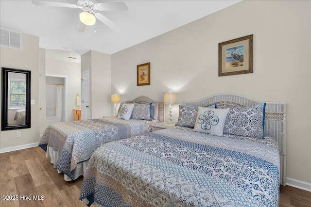 145 Royal Poste Rd # 3110, Sunset Beach, NC 28468 - bedroom with wood finished floors, a ceiling fan, and ensuite bathroom