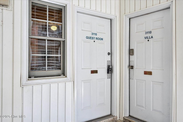 145 Royal Poste Rd # 3110, Sunset Beach, NC 28468 - view of exterior entry with board and batten siding