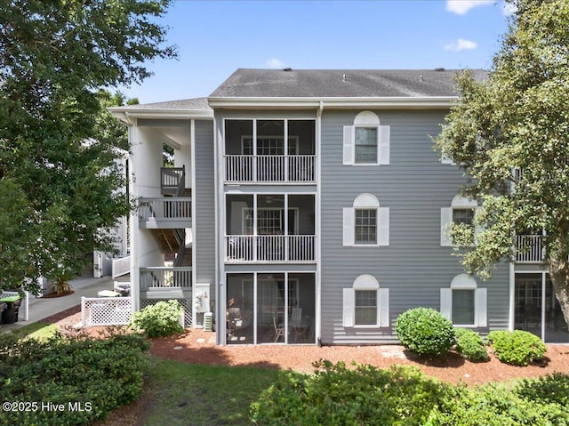 145 Royal Poste Rd # 3110, Sunset Beach, NC 28468 - rear view of property with a shingled roof