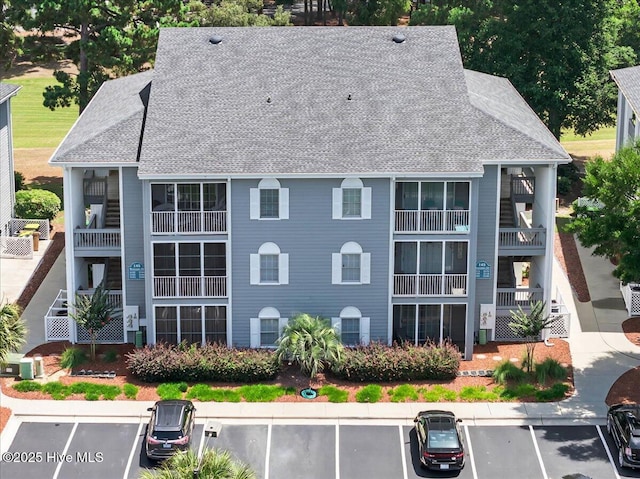 145 Royal Poste Rd # 3110, Sunset Beach, NC 28468 - view of property featuring uncovered parking