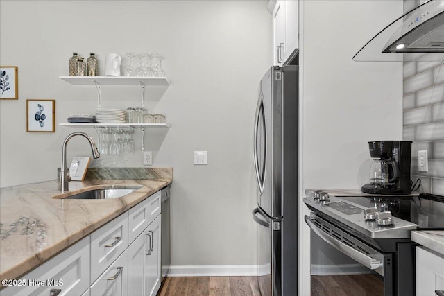 145 Royal Poste Rd # 3110, Sunset Beach, NC 28468 - kitchen featuring freestanding refrigerator, electric range, wood finished floors, white cabinetry, and light stone countertops