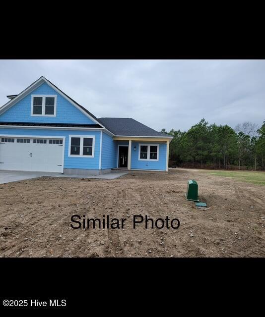 459 Fowler Manning Rd, Richlands, NC 28574 - view of front of property with concrete driveway and an attached garage
