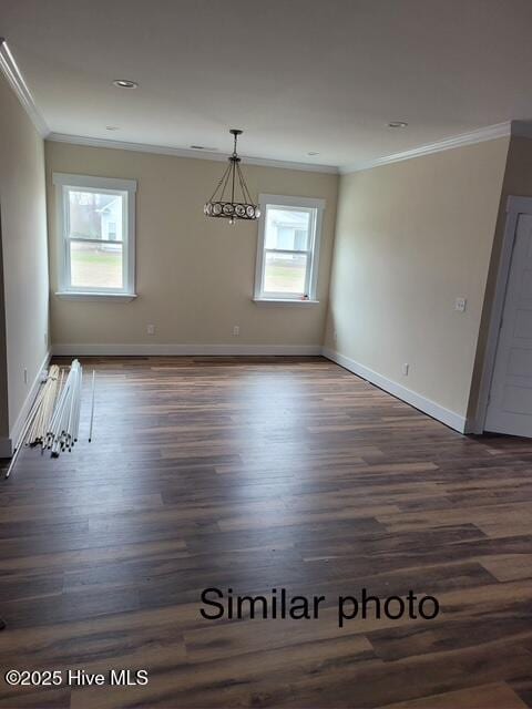 459 Fowler Manning Rd, Richlands, NC 28574 - unfurnished dining area featuring dark wood-style floors and ornamental molding