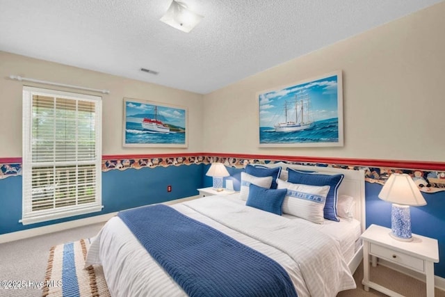 26 Combine Ln SE, Leland, NC 28451 - carpeted bedroom featuring a textured ceiling