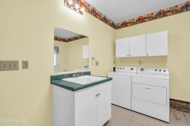 26 Combine Ln SE, Leland, NC 28451 - laundry room with washing machine and clothes dryer, cabinet space, and light tile patterned floors