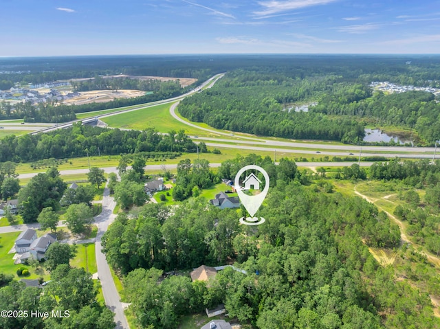 26 Combine Ln SE, Leland, NC 28451 - aerial view of property's location featuring a heavily wooded area