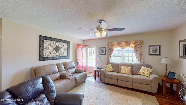 955 Spring Bank Rd, Goldsboro, NC 27534 - living room featuring a ceiling fan, a textured ceiling, and wood finished floors